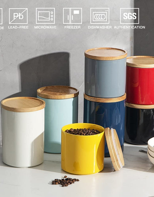 Load image into Gallery viewer, Kitchen Canisters 58 FL OZ Ceramic Food Storage Jar, Stackable Containers with Airtight Seal Wooden Lid for Serving Coffee Bean, Flour, Tea, Cookies and More (Navy)
